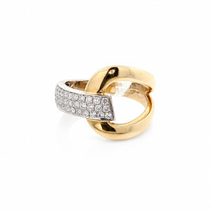 Gold and silver ring with diamond accents on a white background