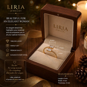 Liria Jewelry ring in a wooden box with product details and measurements.