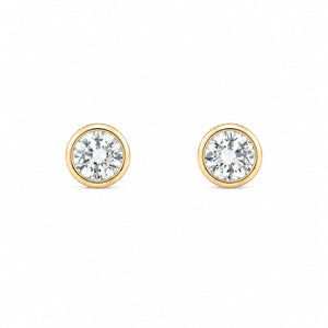 Pair of gold round diamond stud earrings on a white background