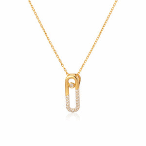 Gold necklace with a unique pendant on a white background