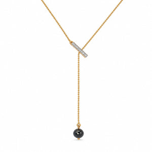 A gold Y-necklace featuring a horizontal bar pavé-set with clear stones and a dangling beaded chain ending in a round black gemstone pendant, shown on a plain white background.