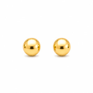 Pair of gold spherical earrings on a white background