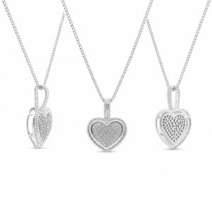 Three heart-shaped pendants on chains against a white background