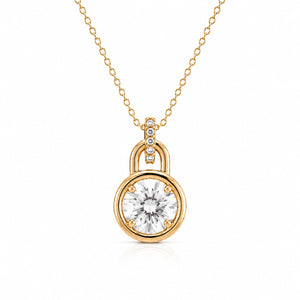 Gold lock-shaped pendant with a diamond on a white background