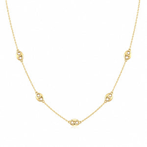 Gold necklace with small circular pendants on a white background
