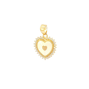 Gold heart-shaped pendant with a smaller heart in the center on a white background