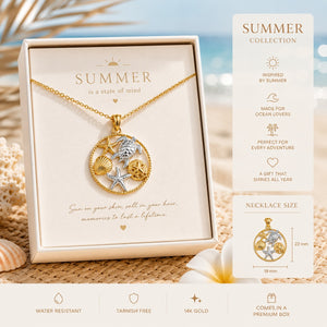 Gold necklace with seashell and starfish pendant in a 'Summer' collection box.