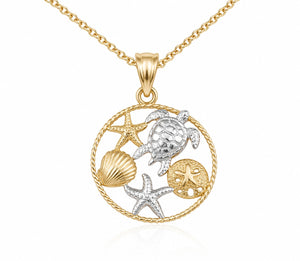 Gold and silver pendant with turtle, shell, and starfish on a white background
