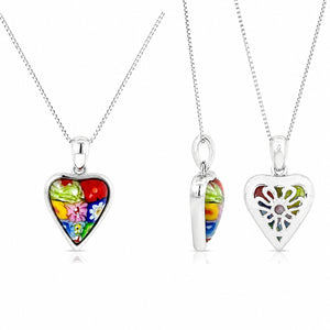 Three heart-shaped pendants on silver chains with colorful designs against a white background