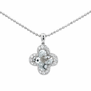 Silver quatrefoil pendant necklace on a white background