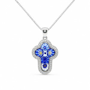Blue floral pendant on a silver chain against a white background