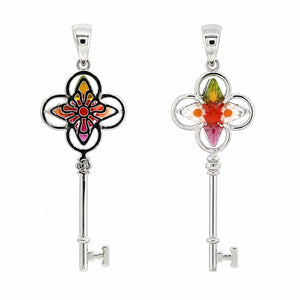 Pair of silver key pendants with colorful floral designs on a white background