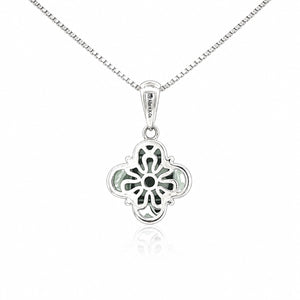 Silver quatrefoil pendant necklace on a white background