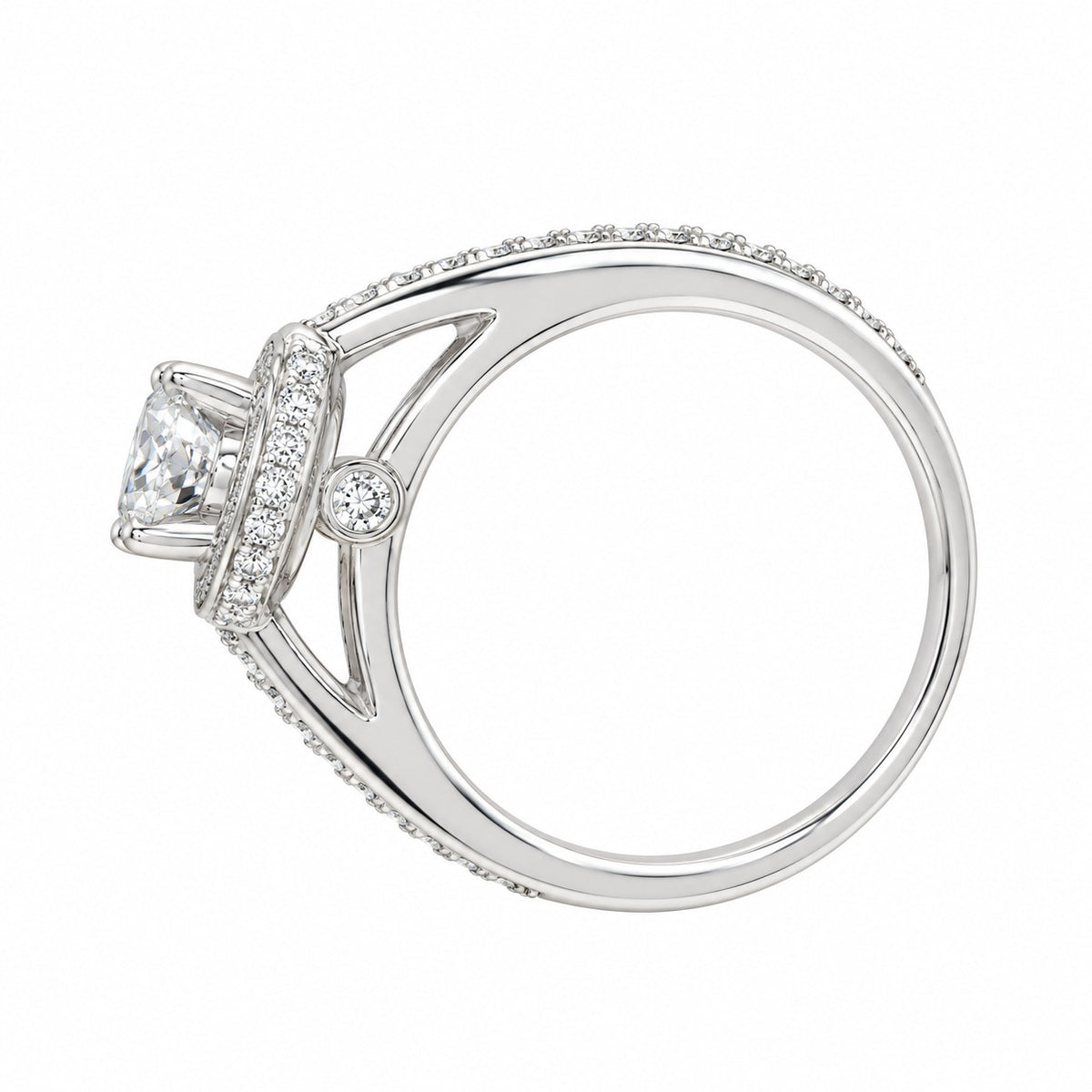 A white gold diamond ring with a square-cut center stone and pavé-set accent stones on a clean white background.