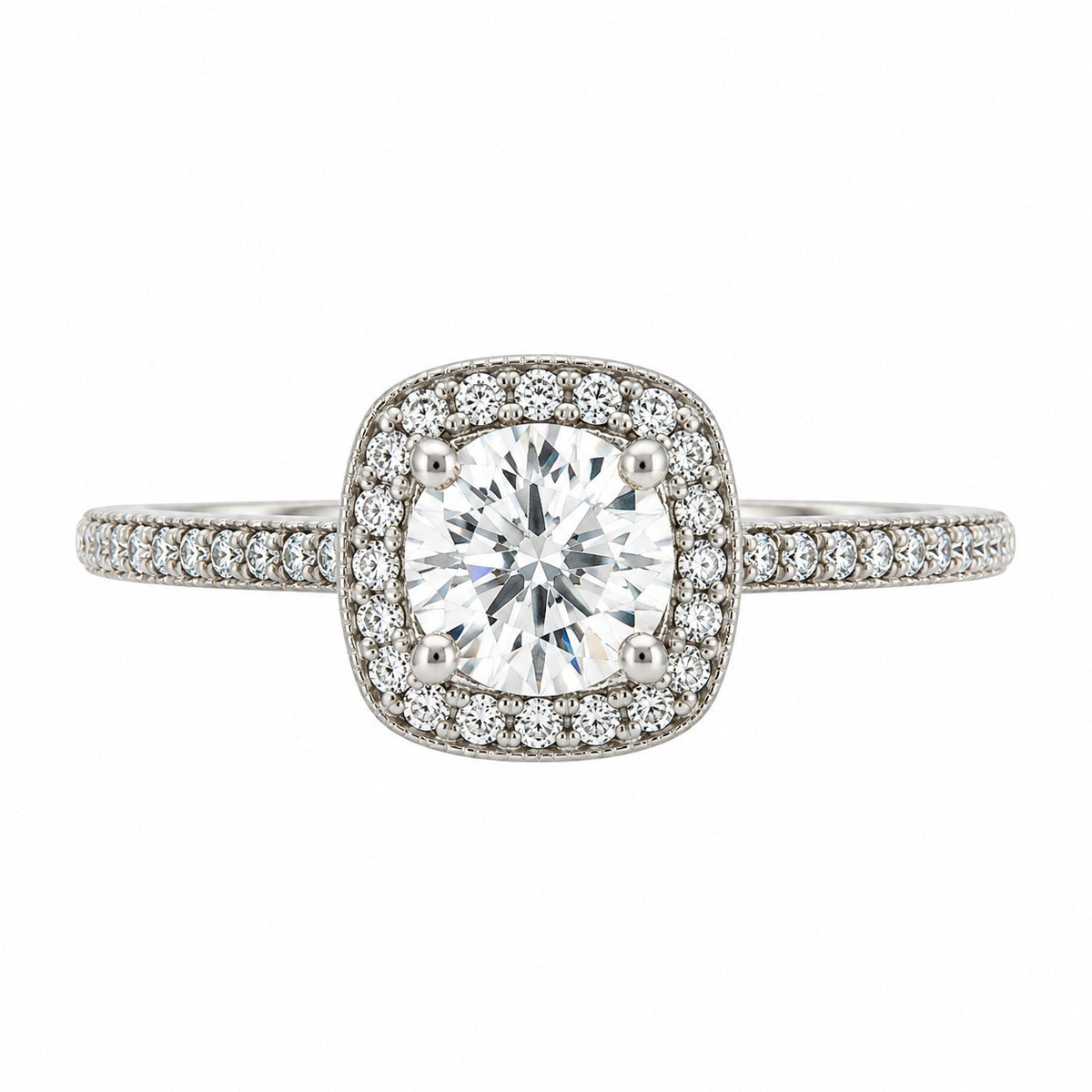 A square halo engagement ring featuring a round brilliant-cut center diamond surrounded by a double halo of smaller diamonds, set on a silver-colored band with pavé diamonds, shown against a plain white background.