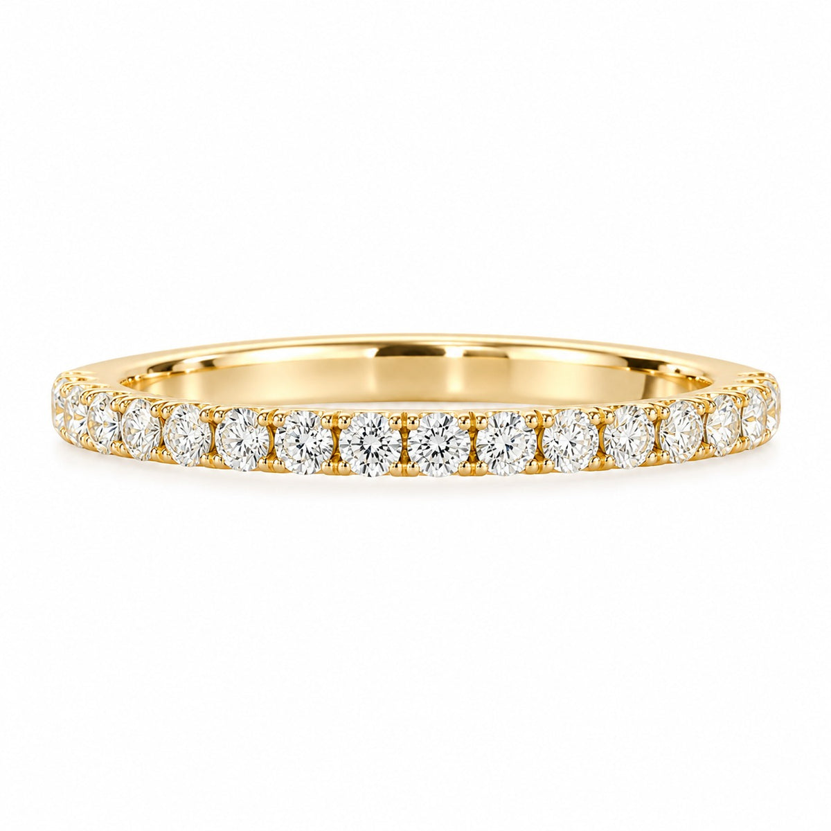 14K yellow gold 0.23 CT lab-grown diamond wedding band featuring 17 brilliant round diamonds in a delicate prong setting on a clean white background.