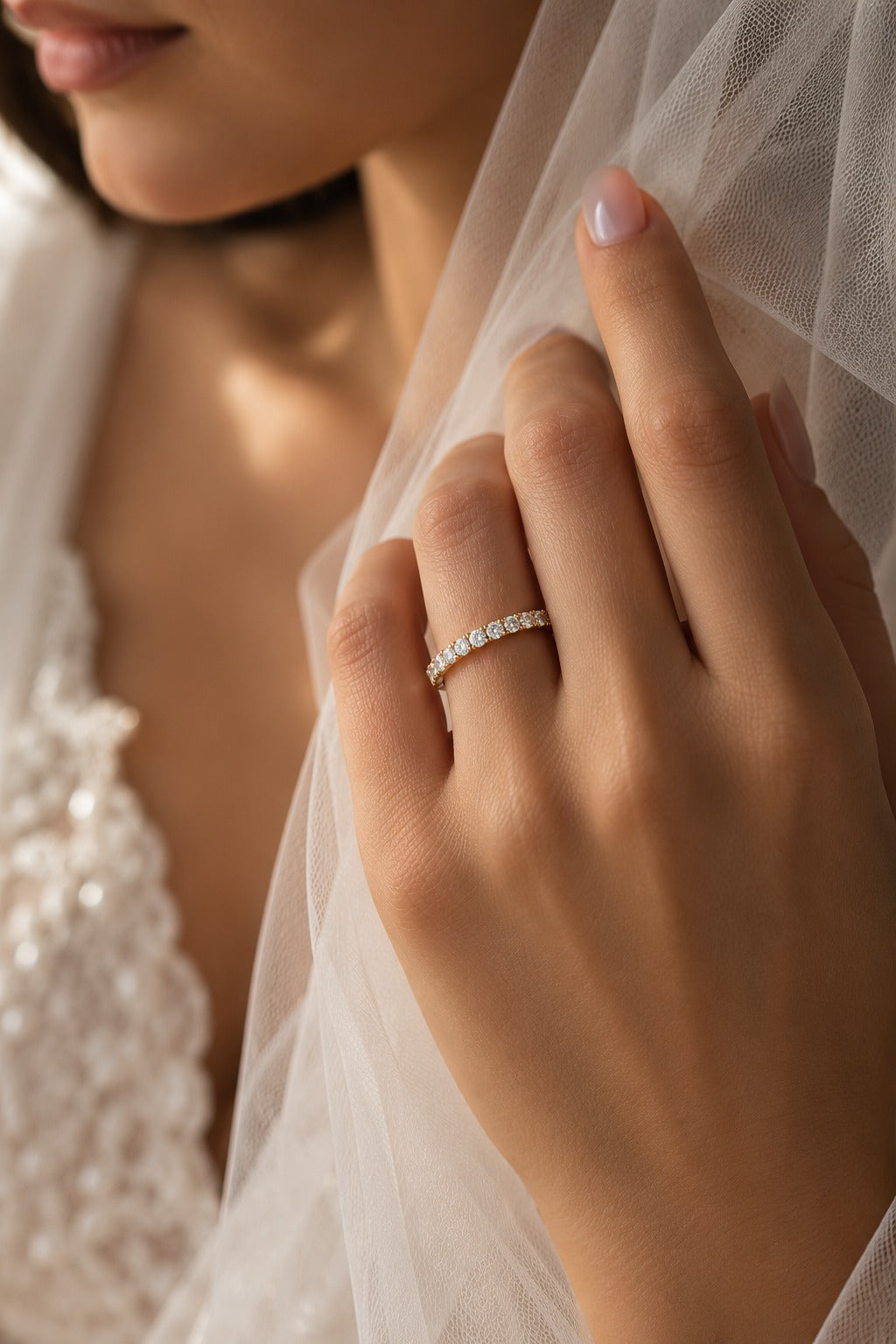 Bride wearing a delicate 14K yellow gold wedding band featuring 15 round lab-grown diamonds totaling 0.39 CT, elegantly displayed on her ring finger.