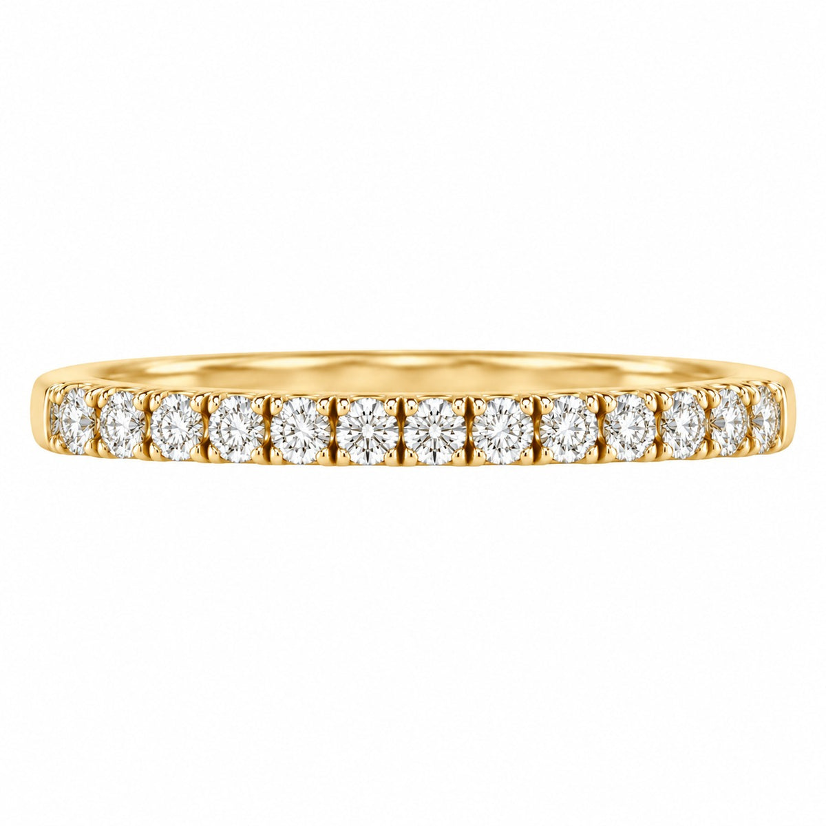 A yellow gold eternity ring featuring a continuous row of round-cut diamonds set in a prong setting, shown against a plain white background.