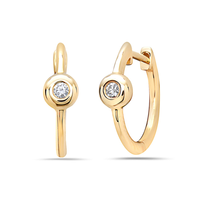 Gold hoop earrings with embedded diamonds on a white background