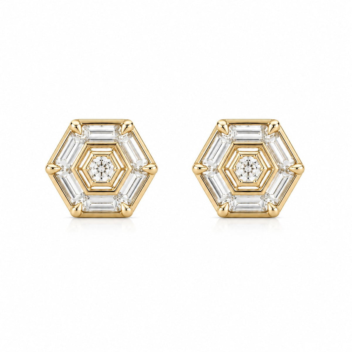 Hexagonal gold and diamond earrings on a white background
