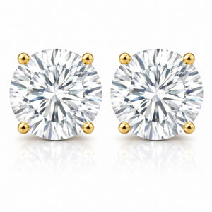 Pair of diamond stud earrings with gold prongs on a white background
