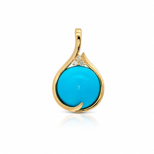 A gold teardrop pendant featuring a large, smooth round turquoise cabochon and a small cluster of clear accent stones at the top, set against a clean white background.