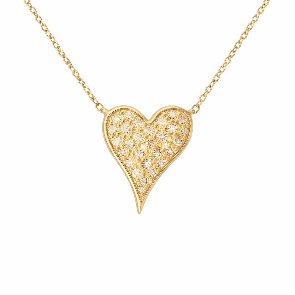 Gold heart-shaped necklace with diamonds on a white background
