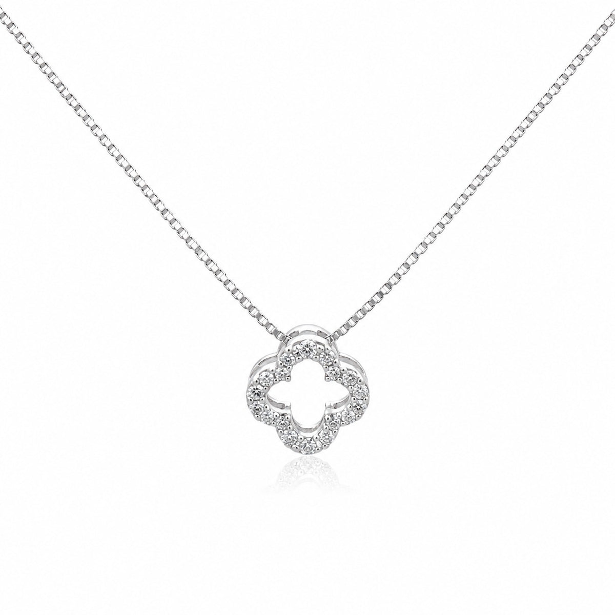 Silver necklace with a clover-shaped pendant on a white background