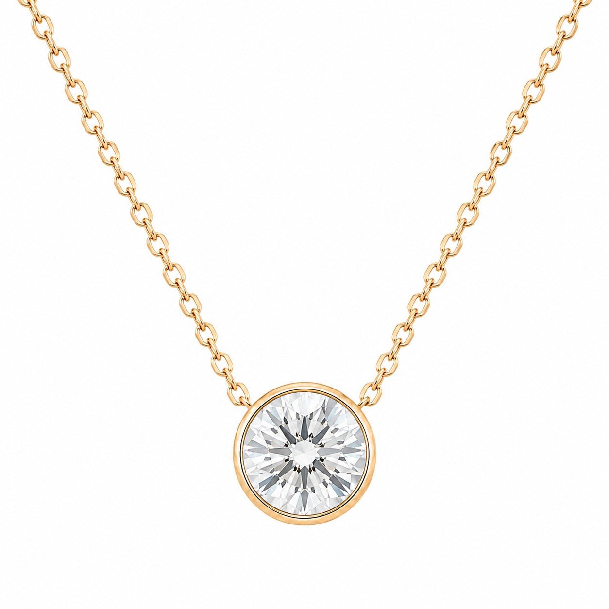 Gold necklace with a round diamond pendant on a white background