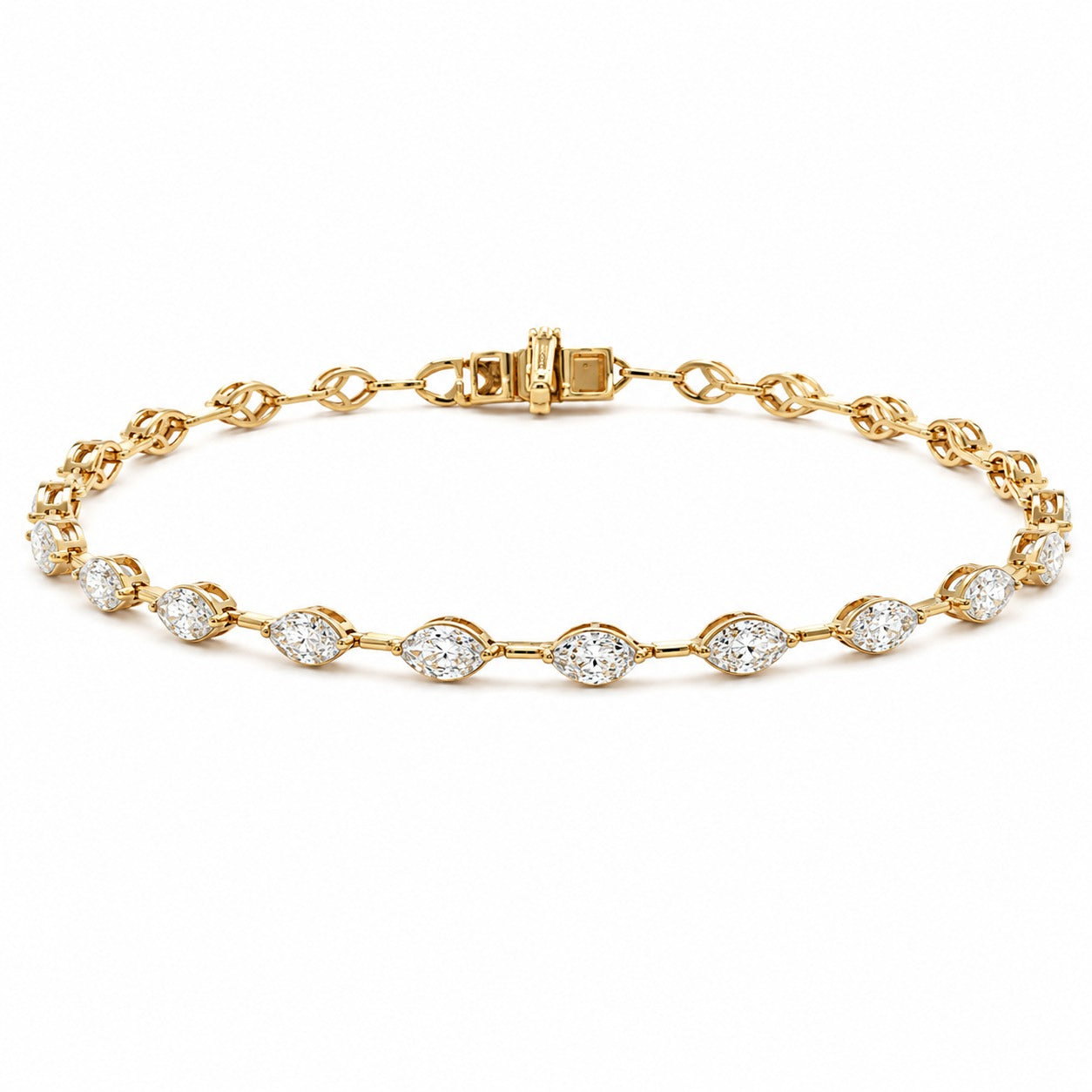 A yellow gold tennis bracelet featuring a series of marquise-cut and round diamonds set along the chain, displayed on a clean white background.