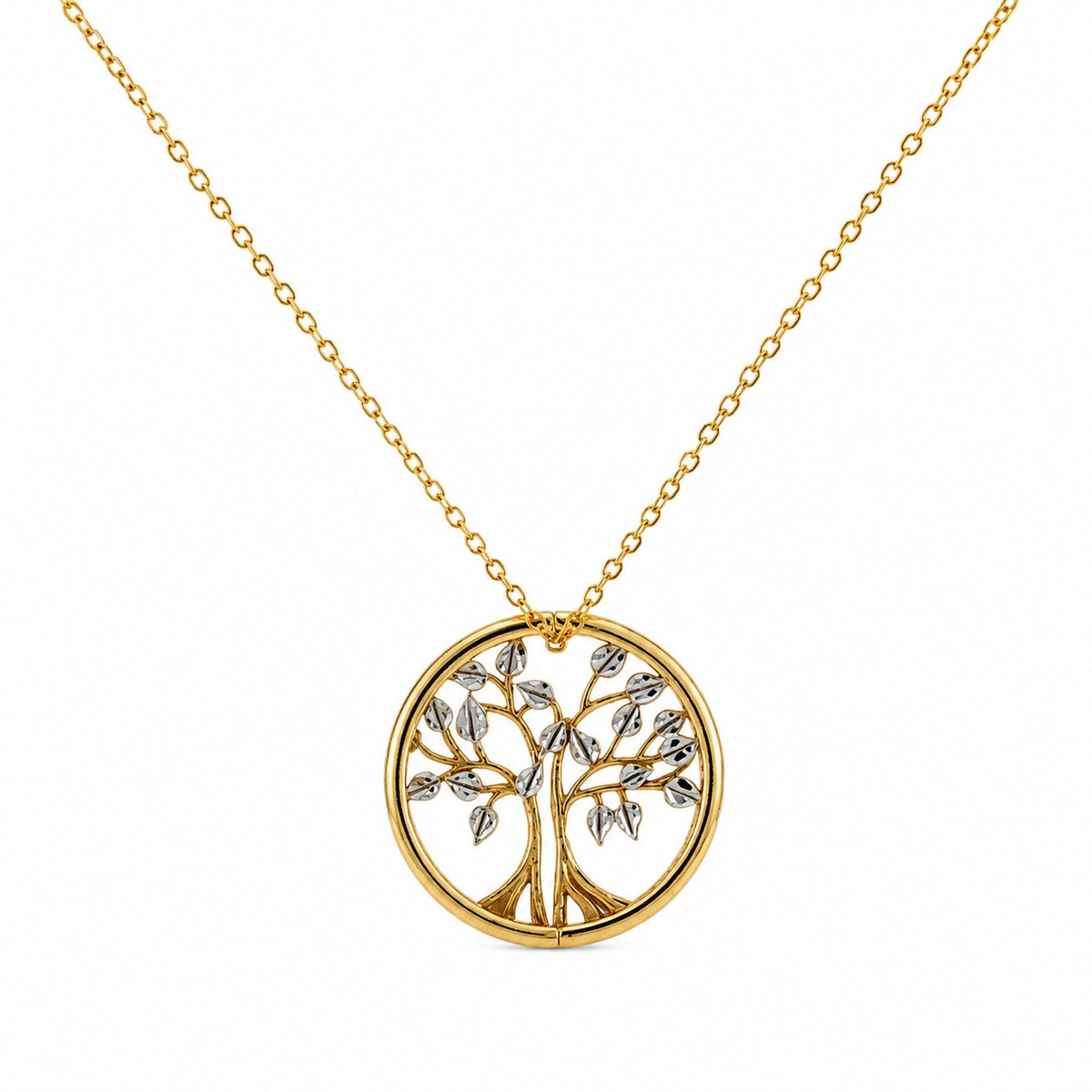 A gold necklace with a circular pendant featuring a tree design with silver-toned leaves, shown on a plain white background.