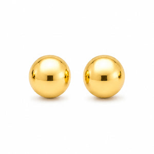 Pair of gold spherical earrings on a white background