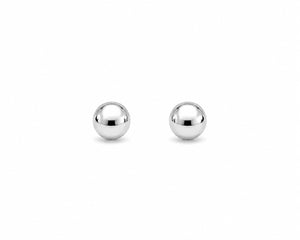 Pair of silver spherical earrings on a white background