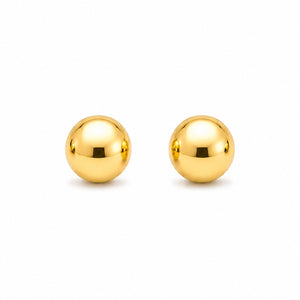Pair of gold spherical stud earrings on a white background
