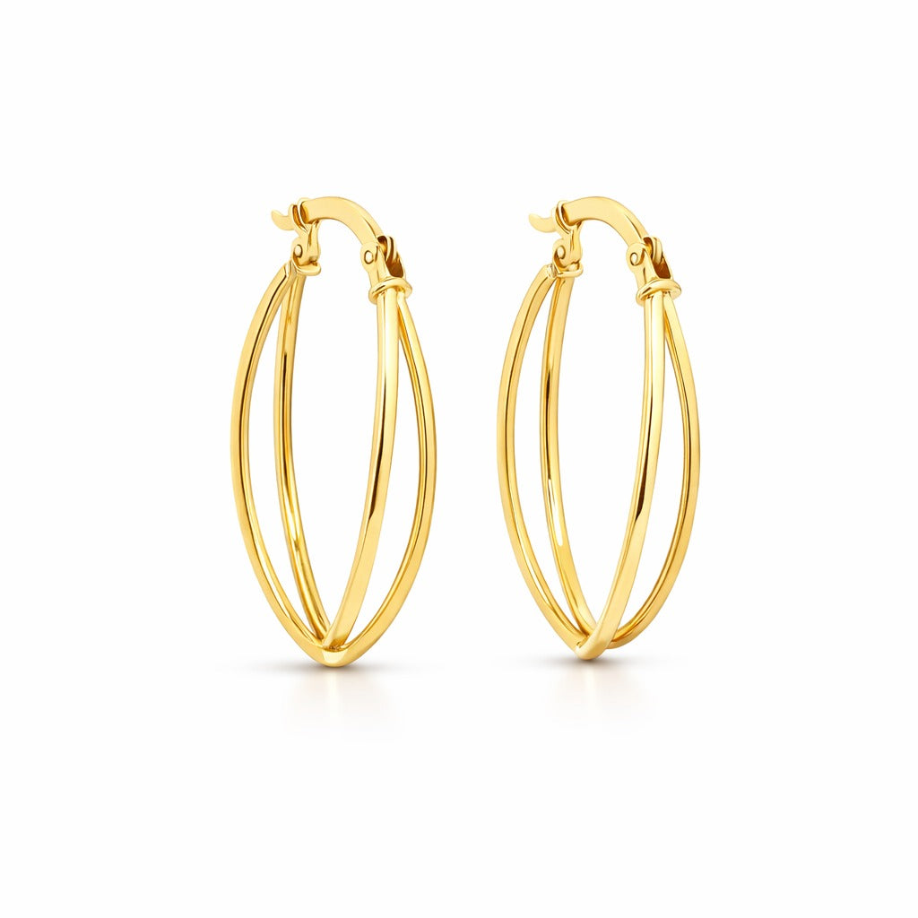 Gold hoop earrings on a white background
