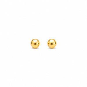 Pair of gold spherical earrings on a white background