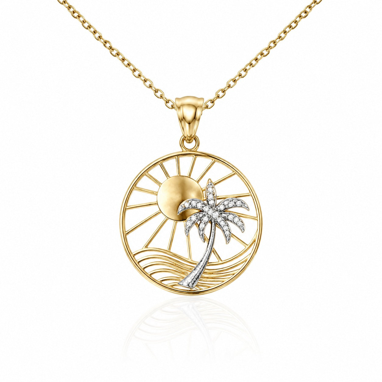 Gold necklace with a palm tree and sun pendant on a white background