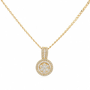 A gold chain necklace with a circular pendant set with clear gemstones, shown against a plain white background.