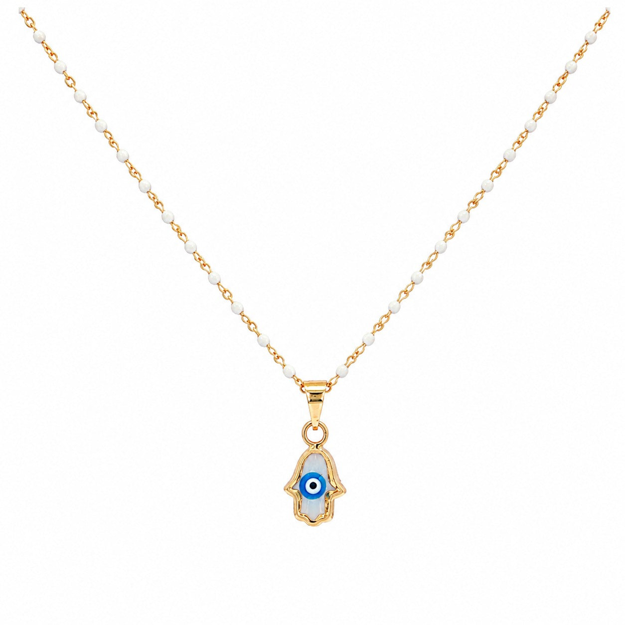 A delicate necklace featuring a gold-tone chain with small white beads and a Hamsa hand pendant. The pendant is detailed with a blue and white evil eye motif and a gold-tone Hamsa hand outline, set against a plain white background.