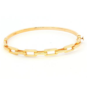 Gold chain bracelet on a white background