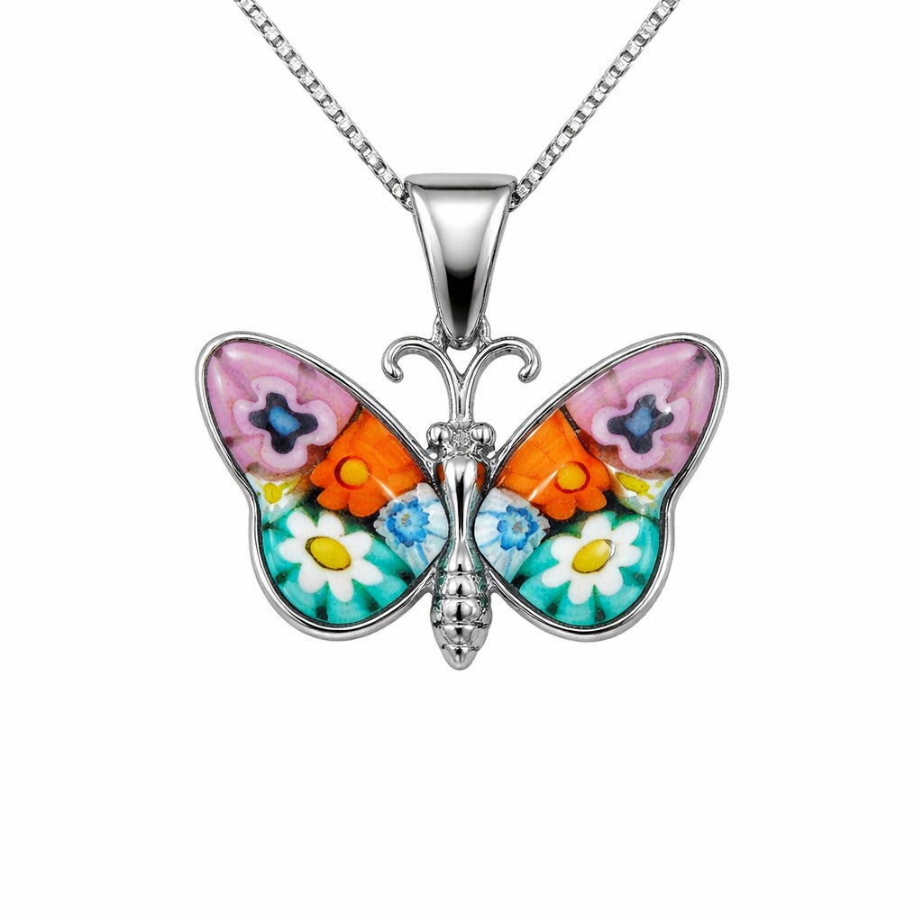 Butterfly-shaped pendant with colorful wings on a white background