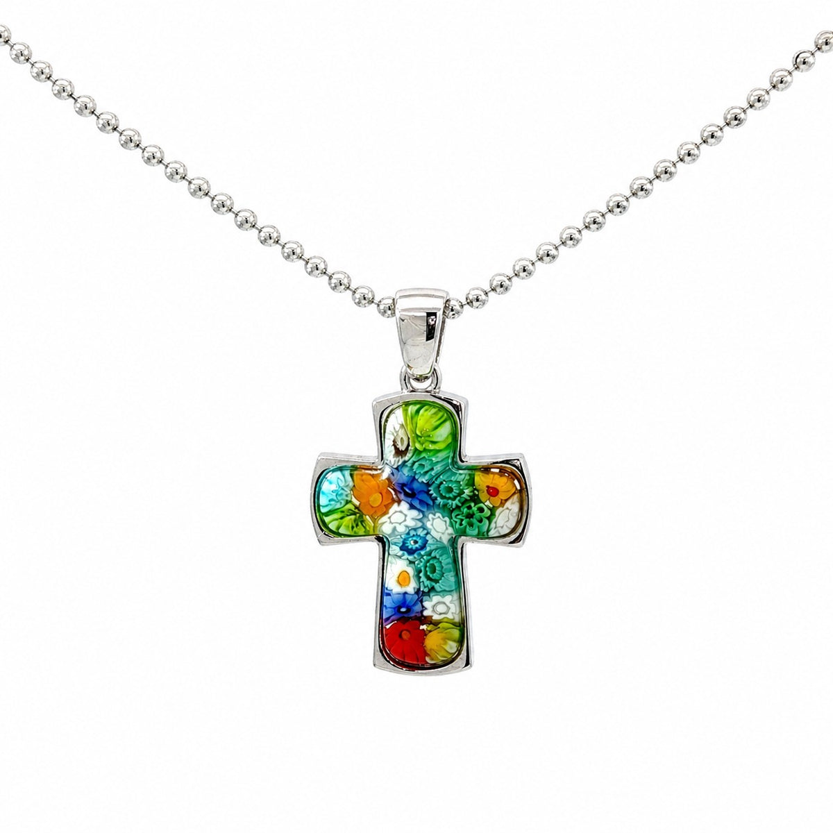Colorful cross pendant on a silver chain against a white background