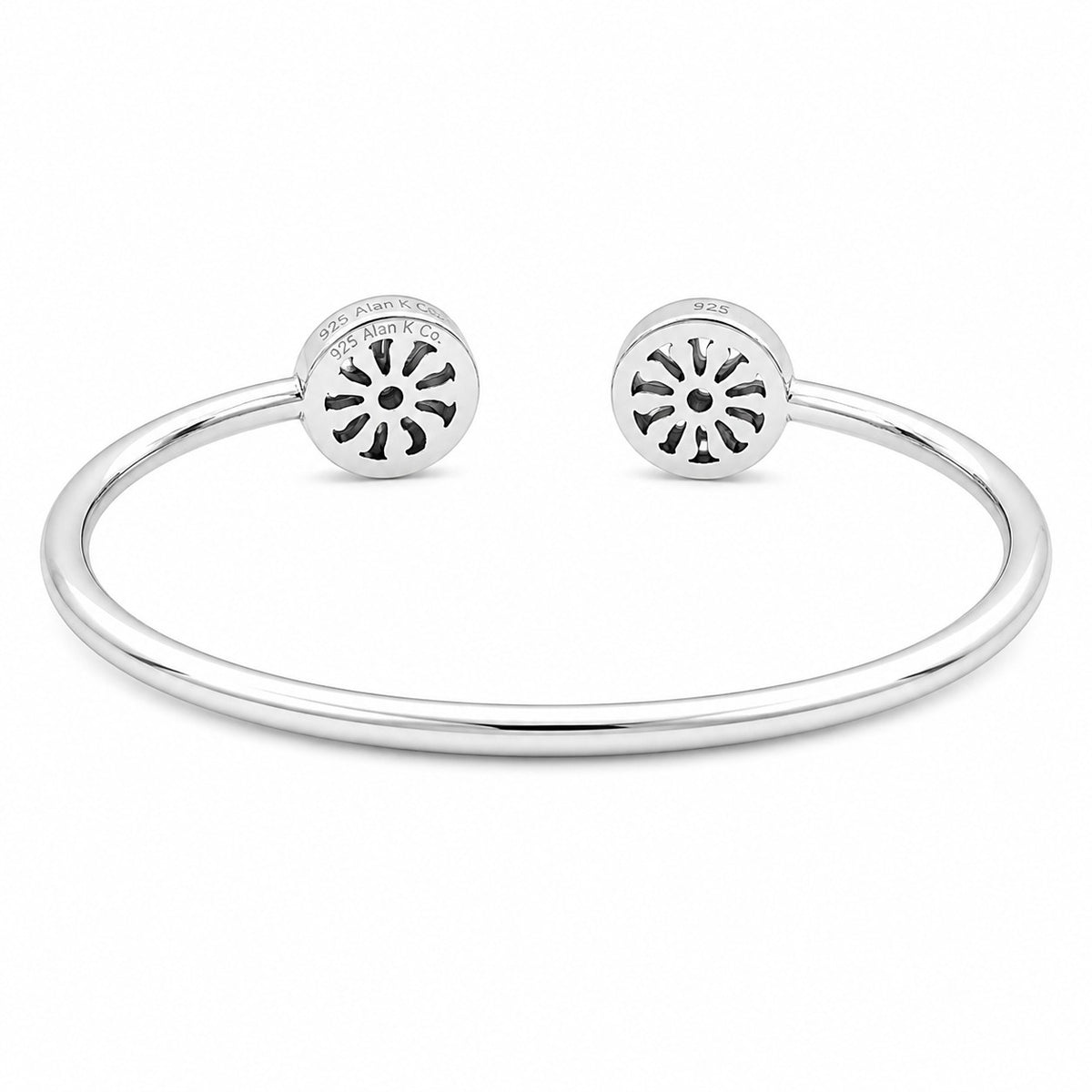 Open silver bangle bracelet with two round multicolor ends and crystal halo detail