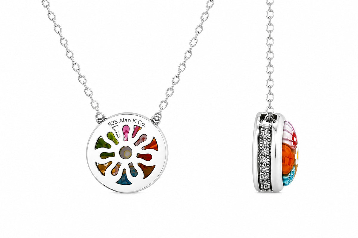 Colorful circular pendant on a silver chain with 'Alan K Co' branding.