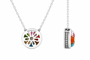 Colorful circular pendant on a silver chain with 'Alan K Co' branding.
