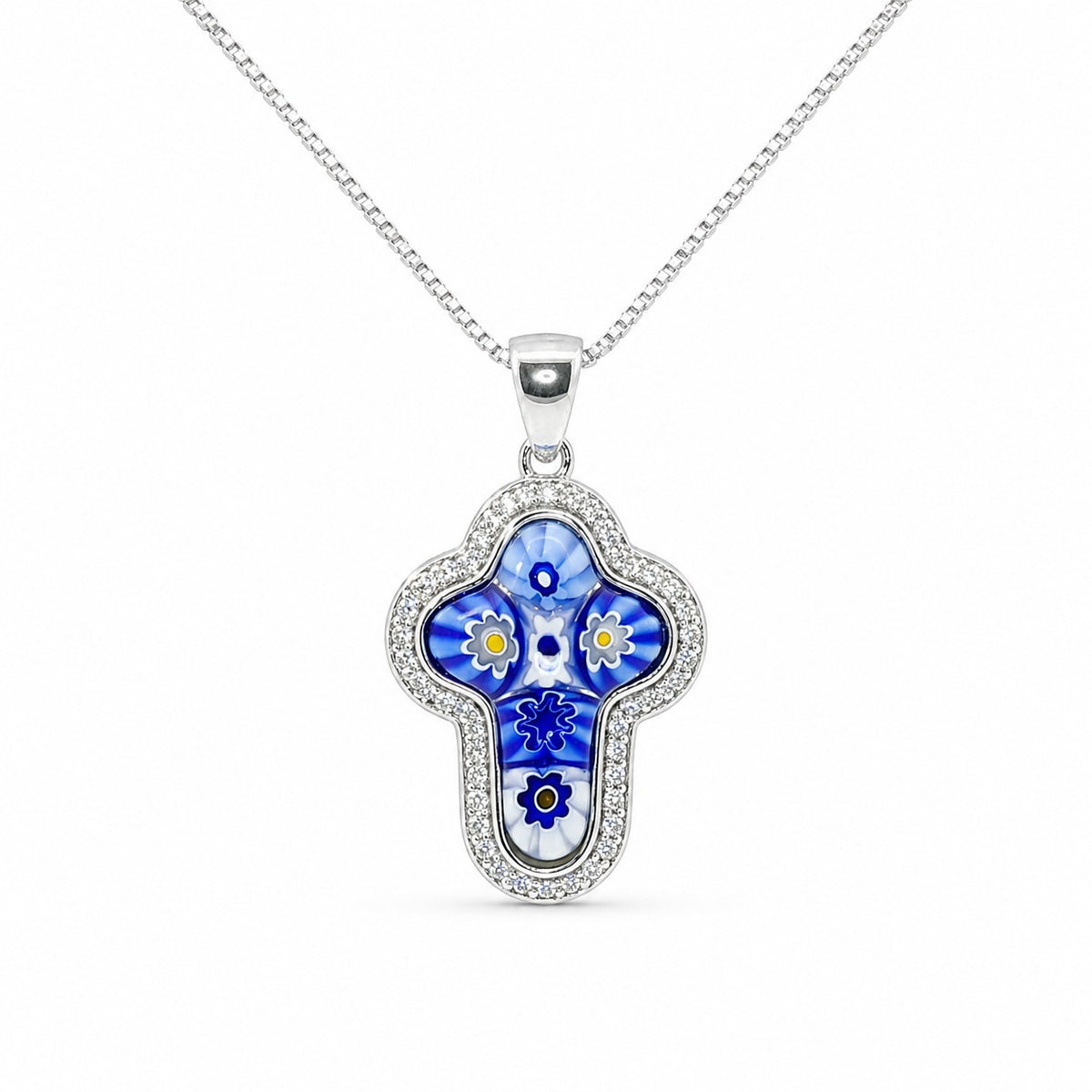 Blue floral pendant on a silver chain against a white background