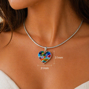 Colorful heart-shaped pendant on a silver chain with measurements displayed.