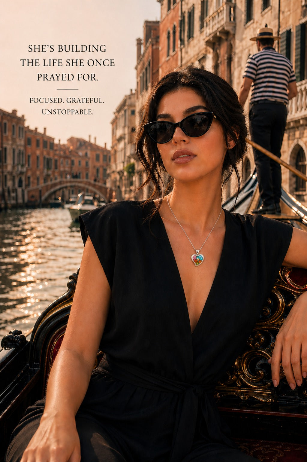 Woman in a black dress and sunglasses on a gondola in Venice with text overlay.