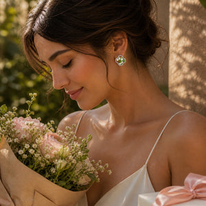 Woman holding a bouquet of flowers with a blurred natural background