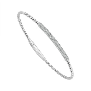 14K white gold diamond bracelet with a delicate beaded design and pavé diamond centerpiece displayed on an elegant beige marble background.